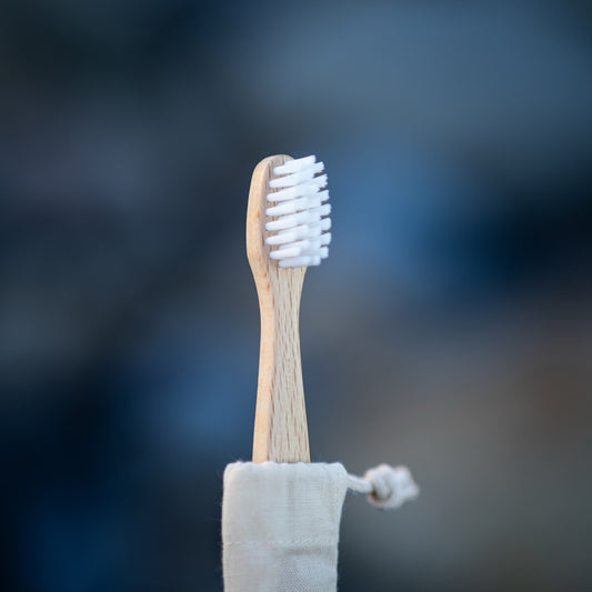 Toothbrush, small, waxed beechwood, vegan synthetic bristles, bio-based, 16cm, in a cotton bag